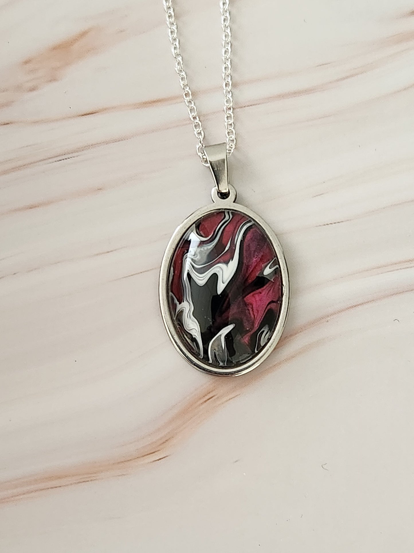 Red and Black Swirl Oval Pendant